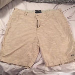 Tan Billabong board shorts